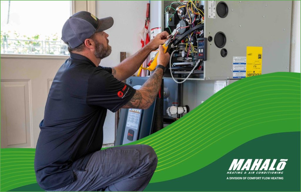 A Mahalo HVAC tech servicing an HVAC Unit
