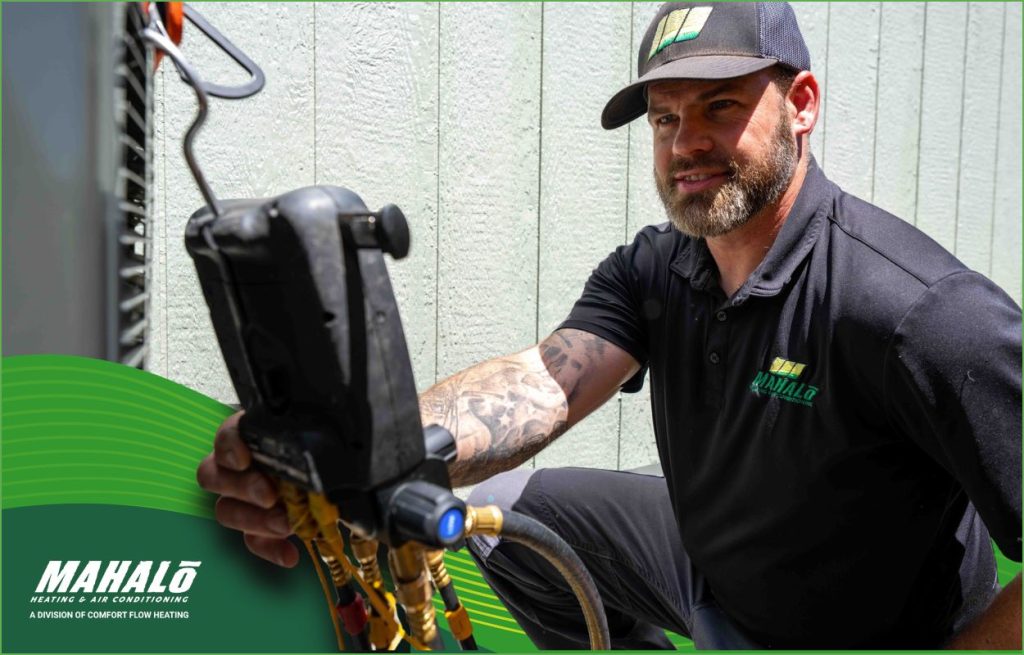A Mahalo HVAC tech working on a AC system.
